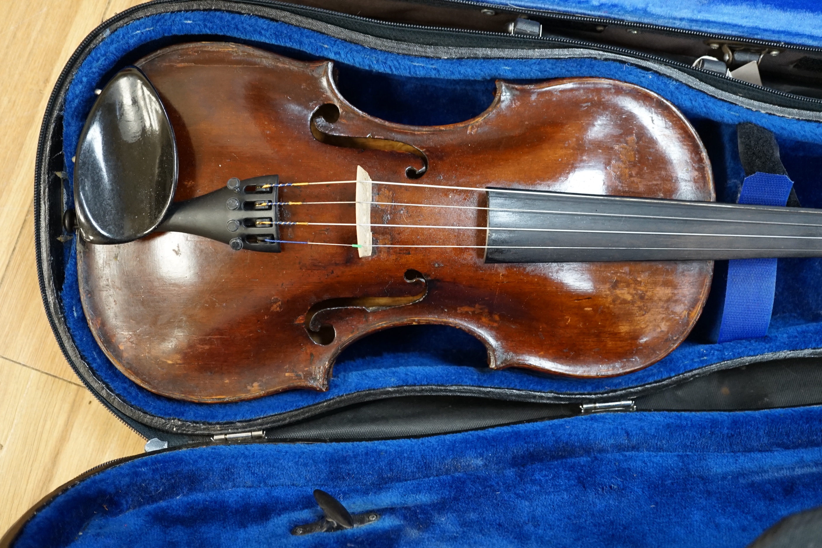 A 19th century English violin, bears hand written paper label, a modern Stentor violin and a metronome